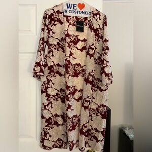 Cute burgundy and cream duster. Never worn